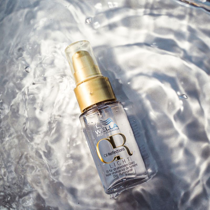 Argan Hair Serum glass bottle in soft light